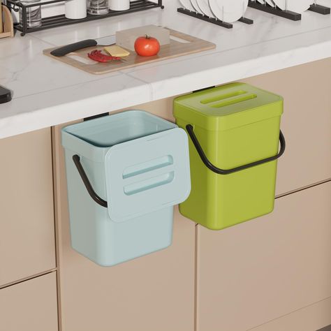 PRICES MAY VARY. Hang/Wall mount Trash Can: this under sink trash can and recycle bin blue could be easily hung on kitchen cabinet doors, pantry doors. (The thickness of the door should be less than 0.9 inch) Moreover, this food waste basket can also be wall-mounted to under sinks, cupboard, kitchen wall or bathroom wall with adhesive pad Trap Smell Inside: designed with tight lid, this wall mount small kitchen trash can ensures garbage stay inside and isolate odors, preventing any spills and me Compost Container, Compost Bucket, Kitchen Trash Can, Under Sink Cabinet, Trash Can With Lid, Kitchen Trash, Pantry Doors, Kitchen Trash Cans, Trash Bin