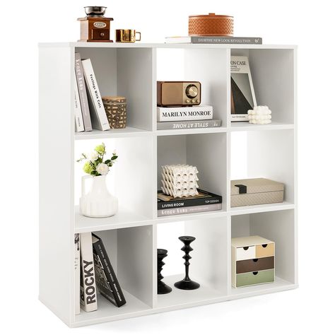 PRICES MAY VARY. [Stylish Storage Solution]: The bookshelf includes a wide top & 9 cubes to maximize the storage & ideally eliminate clutters, while its cubes come in 2 depths (11" & 11.5"). Also, it features a modern & divided design, offering a trendy way to organize your decorations & storage boxes. [Durable & Thick Boards]: Made of thickened boards, Giantex bookcase is built to support a great weight up to 353 lbs, while being durable for a long-term use. More, it resists cracks & comes with Playroom/living Room, Kids Cabinet, Space Concept, Open Cube, Cube Bookcase, Edge Banding, White Bookcase, Living Room Organization, Plastic Furniture