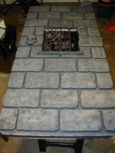 minus the skulls etc -making castle walls from foam insulation sheets! Halloween Outside, Halloween Props Diy, Halloween Graveyard, Exacto Knife, Haunted Castle, Halloween Ii, Diy Concrete, Halloween Decorating, Castle Wall