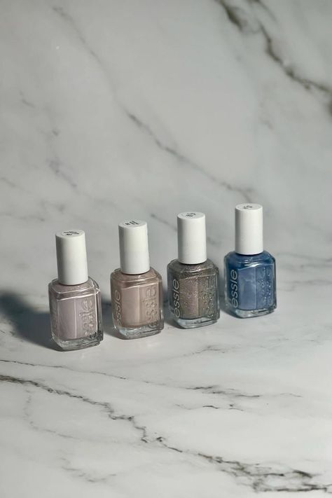 essie nail polish bottles L to R: pillow talk-the-talk, imported bubbly, roll with it!, from a to zzz on gray marble background Pearl Nail Polish, Holiday Nail Colors, Nails Pearl, Best Nail Polish Brands, Manicure Essentials, Pearl Nail, Nail Polish Swatches, Nail Polish Brands, Best Nail Polish