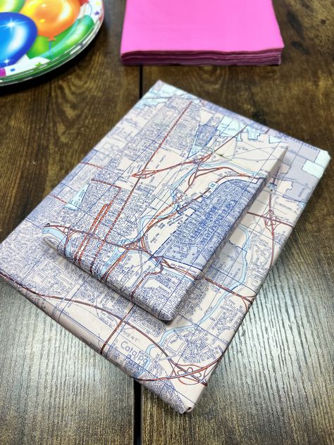 Sometimes you forget to bring the gift bag for a gift and have to improvise with map wrapping paper. Fortunately, I have a few maps around here ... #GiftWrapping #MapHack #LastMinuteGift #CreativeWrapping #GiftGiving #ImproviseAndAdapt #MapPaper #GiftIdeas #DIYWrapping #UnexpectedSurprises #map #mapstagram #maps #mapskills Map Wrapping Paper, Map Bag, Creative Wrapping, Map Paper, Daisy Mae, Map Skills, Diy Wrap, Unique Packaging, Last Minute Gifts