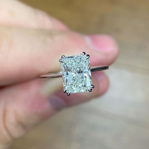 Hamra Diamonds on Instagram: “Our client requested to have her newly chosen radiant set in a solitaire setting with double claw prongs on each corner adding extra design…” Radiant Engagement Ring Double Prong, Double Prong Radiant Engagement Ring, Radient Engagement Rings, Radiant Moissanite Engagement Ring, Radiant Diamond Rings, Radiant Engagement, Radiant Moissanite, Engagement Rings Twisted, Radiant Engagement Rings