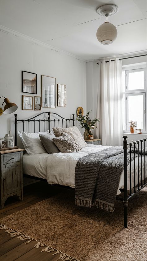 22 Rustic Bedroom Ideas: Modern, Cozy, Farmhouse, and Aesthetic Decor for Small Rooms Minimal Rustic Bedroom, Small Windows Above Bed, Grey Flooring Bedroom Ideas, Iron Bed Frame Ideas, Modern Cozy Farmhouse, Iron Beds Bedroom Decorating Ideas, Metal Bed Frame Bedroom Ideas, Rustic Bedroom Ideas, Minimal Room