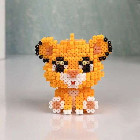 Lion Perler Beads, Lion King Perler Beads, Fuse Beads Ideas, Hammer Beads, Hama Beads 3d, Simba Lion, Perler Creations, Bead Creations, 3d Perler Bead