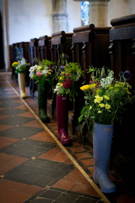 A DIY Village Fete Wedding: Charlie & Jo Gum Boots, Gardening Boots, Boots With Flowers, Glamping Wedding, Ceremony Decorations Outdoor, Meadow Wedding, Church Pews, Village Fete, Pew Ends