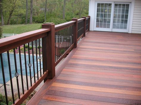 Like this wood color Multi Color Deck Stain Ideas, Deck Skirting Ideas, Stained Deck, Skirting Ideas, House Skirting, Wood Deck Railing, Front Porch Deck, Deck Skirting, Metal Railing