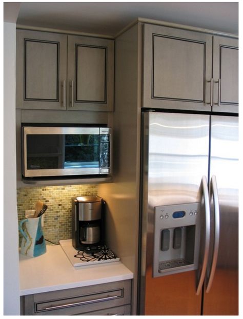 The cabinet is 12" in depth (the shelf is about 15"). Microwave a Panasonic. We added a horizontal filler to close the gap above it and make it look more built-in. GE's Spacemaker and Sharp also makes a few which can go into a 15" deep cabinet. :: pinned from Houzz thread Layout Kitchen, Curtains Kitchen, Remodel Diy, Farmhouse Kitchen Remodel, Microwave In Kitchen, Diy Kitchen Remodel, Eclectic Kitchen, Kitchen Remodel Before And After, Kitchen Designs Layout