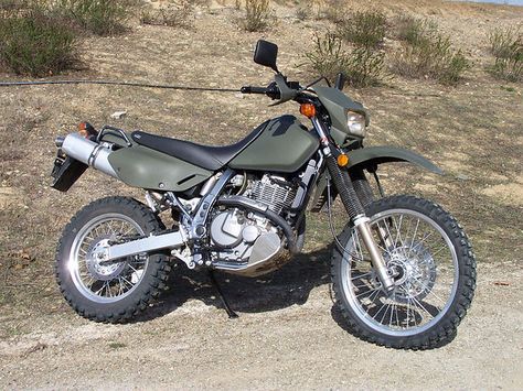 Suzuki DR 650 in olive drab. This would be perfect for tooling around the ADKs! Dual Sport Motorcycles, Suzuki Dr650, Sport Motorcycles, Cheap Sports Cars, Dr 650, Dual Sport Motorcycle, Enduro Motorcycle, Dual Sport, Adventure Motorcycling