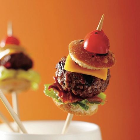 Oh, food on a stick. Does it get any cuter, more Pinterest-y, or cocktail-friendly than cake pops, kabobs, popsicles, and more? To celebrate the summery season of entertaining, we're serving up 100 different foods you can serve, eat, and gawk at… on a stick! Bon appetit! Mini Hamburger, Wedding Appetizers, Finger Food Appetizers, Snacks Für Party, On A Stick, Party Food Appetizers, Mini Foods, A Stick, Wedding Food