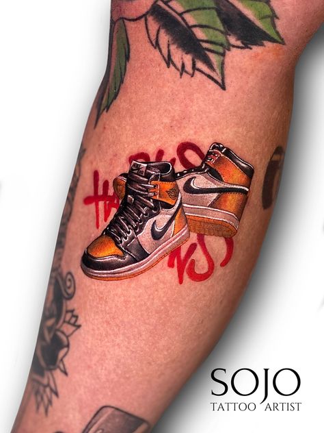 Hyper realistic tattoo Nike Jordan shoes Air Jordan Tattoo Ideas, Jordan 1 Tattoo, Realistic Color Tattoo, Tattoo Nike, Jordan Tattoo, Nike Jordan 1, 1 Tattoo, Head Tattoos, Color Tattoo