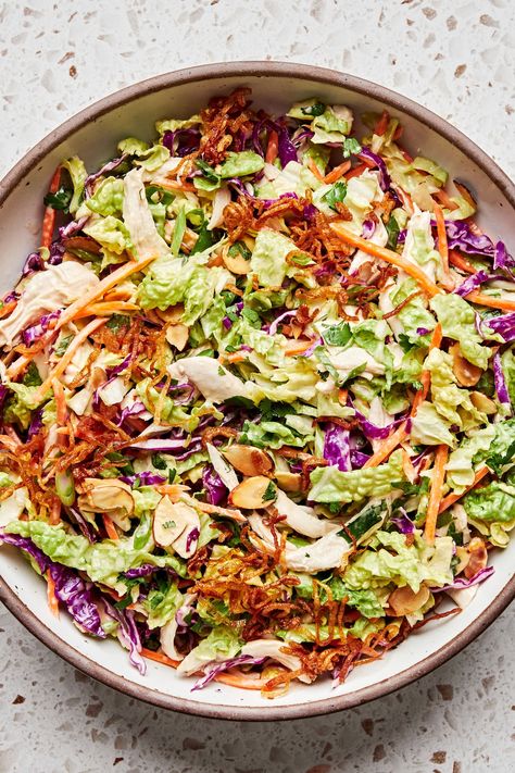 Crunchy green and red cabbage serves as a colorful backdrop for this miso-ginger slaw with shredded chicken. There’s lots of great flavor and texture in this hearty slaw. Cold Dinner Ideas, Healthy Shredded Chicken Recipes, Ginger Slaw, Best Picnic Food, Picnic Food Ideas, Colorful Backdrop, The Modern Proper, Modern Proper, Crunchy Salad