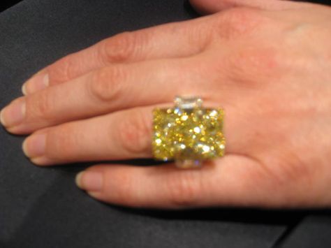 The mother of all diamond rings....At a behind the scenes tour of the Harry Winston store in NYC and wearing this yellow diamond stunner.  The diamond was ice cold! Harry Winston, Yellow Diamond, Diamond Rings, Behind The Scenes, Diamond Earrings, Sunflower, Necklaces, Yellow, Quick Saves