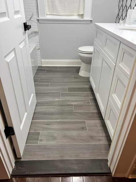 Bathroom Ideas Gray Floor, Simple Bathroom Floor Tile Ideas, Bathroom Grey Wood Floor, Bathrooms With Wood Tile Floors, Grey Floor Tile Bathroom, Laminate Floor Bathroom, Bathroom Laminate Flooring Ideas, Bathroom Lvp Flooring, Vinyl Wood Flooring Bathroom