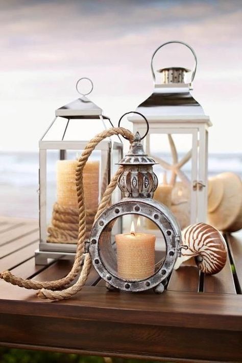 Lanterns are an easy, affordable way to dress up your space for the holidays — both inside and out. Deco Marine, Dream Beach Houses, Seaside Decor, Cottage By The Sea, Decor Shabby Chic, Beachy Decor, Nautical Home, Beach Living, Coastal Cottage