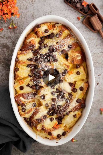 9.9M views · 8.6K reactions | Cannoli French Toast Bake | cannoli, French toast | Cannoli French Toast Bake | By Food Dolls | Let's make cannoli for breakfast. This is going to blow your mind. Take your brioche bread, slice it up, and then you're going to make your cannoli filling. And then you're going to spread it on two slices and you're going to cut them into squares. And then add it in your baking dish and then you're going to pour that custard on top and then top it with some chocolate chips. Pop it in the oven and when it's done, it's cannoli for breakfast. You guys this is fantastic. It's so good and it checks off all the boxes. Yes. Italian Bread French Toast Bake, Cannoli French Toast Bake, Carmel French Toast Bake Overnight, Overnight Caramel French Toast Casserole, Cannoli French Toast, Breakfast Toasts, Cannoli Filling, Food Dolls, Brioche Bread