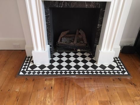 Checkered Fireplace, Checker Tile, Victorian Beach House, Fire Hearth, Tile Fireplace, Penny Tile, Tile Showroom, Fireplace Hearth, Black And White Tiles