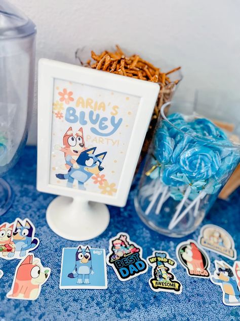 Fun Bluey Party Ideas + FREE Printables Bluey Birthday Printables, Free Bluey Birthday Printables, Bluey Themed Food Ideas Printable, Bluey Party Favor Printables Free, Pin The Tail On Bandit Bluey, Keepy Uppy Printable Bluey Free, Daisy Flower Crown, Orange Balloons, Blue Food Coloring