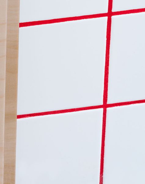 Bright red grout between white tiles was used to brighten up this bathroom. Jungle Brothers, Colored Grout, Red Bathroom Accessories, Ceramic Tile Colors, Coloured Grout, Red Bathroom, White Ceramic Tiles, Red Tiles, Bathroom Red