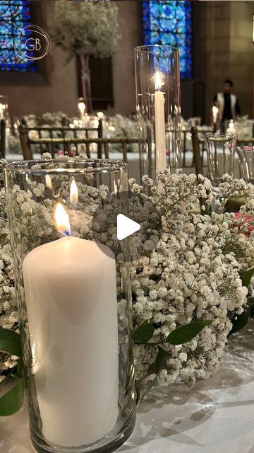 Flowers 🌺 By G Bella- Wedding Stylist|Floral Designer on Instagram: "Have you ever wondered how to create that lush, full look for your long table receptions? Baby's breath is the secret ingredient! Paired with delicate candle holders, it adds warmth and ambiance to any setting.   Do you want to learn more about how to create stunning floral arrangements? Sign up for our emails and stay tuned for our upcoming online classes! 📩  #FlowersByGBella #WeddingDesign #FloralInspiration #OnlineClass #Learning #WeddingFlowers #WeddingStylist #WeddingDecor #WeddingInspo #WeddingPlanning #EventDesign #WeddingDetails #WeddingStyle #WeddingCenterpiece #Centerpieces" Baby's Breath Centerpieces Wedding, Receiving Table Wedding, Baby Breath Wedding Centerpieces, Long Table Flower Arrangements, Rectangular Table Centerpiece, Babies Breath Centerpiece, Baby Breath Centerpiece, Long Table Reception, Delicate Candle