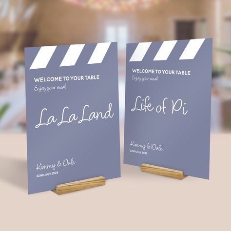 Movie Themed Table Numbers, Movie Wedding Seating Chart, Movie Wedding Centerpieces, Movie Themed Seating Chart, Movie Table Numbers, Film Themed Wedding, Wedding Table Themes Ideas, Wedding Movie Theme, Movie Theme Wedding Ideas