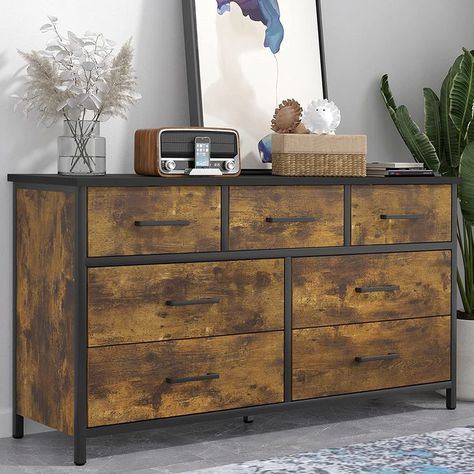 Upgrade your bedroom organization with a 7-drawer dresser. This metal-framed dresser features a durable MDF wooden top and 7 MDF drawers with easy-to-pull metal handles and safety stops. With ample storage space, store all your clothes and accessories in one convenient place. This versatile vertical chest of drawers can be used in various spaces, making it an ideal storage solution for small spaces. Add this stylish industrial-style storage chest to your furniture sets. Click Now! Frame Storage, Storage Dresser, Dresser For Bedroom, 7 Drawer Dresser, Industrial Wood, Industrial Storage, Chests Of Drawers, Wood Dresser, Modern Chinese