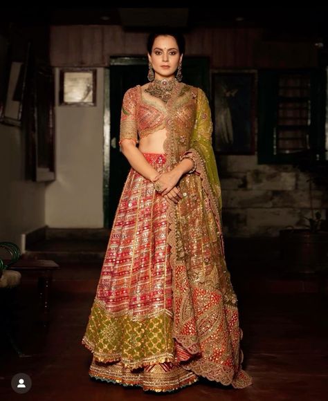 Kangana Ranaut in a bespoke multi-hued double layer lehenga at a family event. Pahadi Wedding, Layer Lehenga, Shloka Ambani, Iridescent Skirt, Mughal Miniature, Ambani Wedding, Isha Ambani, Brother Wedding, Mughal Miniature Paintings