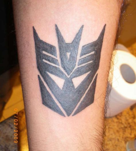 Decepticons Tattoo, Decepticon Tattoo, Transformers Tattoo, Decepticon Logo, Traditional Tattoo Art, Arm Tattoos, Arm Tattoos For Guys, Traditional Tattoo, Tattoo Art