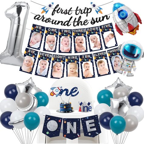 PRICES MAY VARY. 【First Trip Around the Sun Birthday Decorations】This first trip around the sun theme decorations perfect for your baby's one year old birthday. It includes 16 X 12" Matte Balloons (White*4, Grey*8, Light Blue*4, Dark Blue*4),1 X 14"of Moon Balloon, 1 X 24"of Rocket Balloon, 1 X 24"of Astronaut Balloon, 2 X 18" Silver Star Foil Balloons, 1 X "first trip around the sun" Banner, 1 set of monthly Photo Banner, 1 X "ONE" High Chair Banner, 1 X Cake Topper, 1 X Birthday Hat, 1 X 40" N Sun Birthday Decorations, Outer Space Party Favors, First Birthday Decorations Boy, Space Party Favors, Crown Cake Topper, Space Party Decorations, Sun Birthday, 1st Birthday Photo, Boys First Birthday Party Ideas