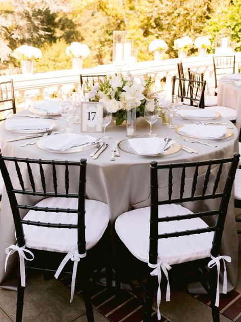 We love a classic color palette so this black and white wedding with hints to Gatsby is right up our alley! This California summer wedding is elegant and gorgeous from start to finish and we're all about the vintage getaway car! Wedding Chairs Black, Black Chavarri Chairs Wedding, Black Chair Wedding Reception, Black Chiavari Chairs Wedding, Black Chairs Wedding, Chivari Chairs Wedding, Black And White Summer Wedding, Black Chiavari Chairs, Black Wedding Reception