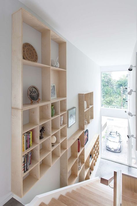 DESIGN DETAIL – A Grid Of Plywood Shelves Follow The Stairs Plywood Shelves, Diy Hanging Shelves, Understairs Storage, Stair Storage, Plywood Furniture, Furniture Hacks, Under Stairs, Interior Architecture Design, Plywood