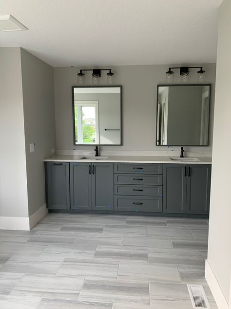 Gray Floors Bathroom, Bathroom With Dark Gray Cabinets, Bathroom Vanity With Grey Floor, Grey Wood Tile Floor Bathroom, Bathrooms With Dark Tile Floors, Grey Bathroom Flooring, Bathroom Gray Floor, Bathroom Grey Floor, Grey Cabinets Bathroom