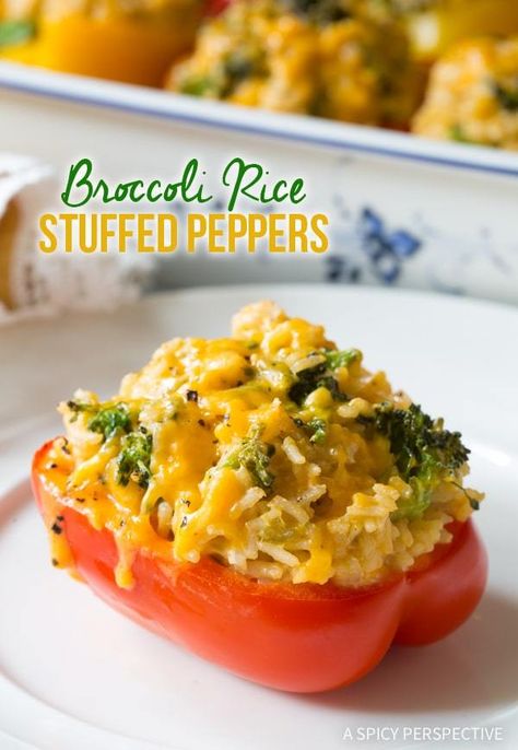 Broccoli Rice Stuffed Peppers #ASpicyPerspective #StuffedPeppersRecipe #StuffedPeppers #VegetarianStuffedPeppers #StuffedPepperswithRice #HealthyStuffedPeppers #BroccoliRice #Cheese #Broccoli #Rice #Vegetarian Stuffed Peppers Recipe Vegetarian, Riced Broccoli Recipes, Rice Stuffed Peppers, Cheesy Broccoli Rice, Recipe Broccoli, Stuffed Peppers With Rice, Vegetarian Stuffed Peppers, Stuffed Peppers Recipe, Cheesy Broccoli