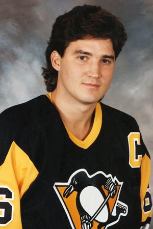 Mario Lemieux was born in 1965 in Montreal, Quebec. One of the most electrifying players and natural scorers to ever take the ice, Mario Lemieux won two Stanley Cups with the Pittsburgh Penguins and rivals Wayne Gretzky as one of the best hockey players ever. Ice Mario, Hockey Images, Nhl Hockey Players, Pittsburgh Pride, Hockey Art, Mario Lemieux, Stanley Cups, Pittsburgh Sports, Pittsburgh Penguins Hockey