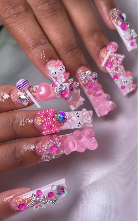 Hello Kitty Aesthetic Nails, Long Chunky Nails, Simple Junk Nails, Candy Junk Nails, Nails With A Lot Of Charms, Candy Nails Acrylic, Hello Kitty Junk Nails, Long Junk Nails, Sanrio Nail Art