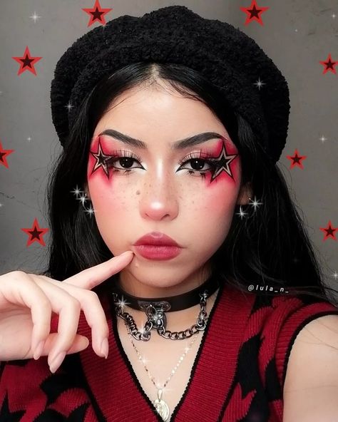 Star Cheeks Makeup, Red Concert Makeup Looks, Alt Y2k Makeup, Creative Face Makeup Art, Insane Makeup Looks, Makeup No Eyebrows, Creative Eye Drawings, Star Makeup Look Eyeliner, Star Makeup Y2k