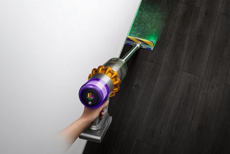 Dyson’s V15 Detect uses lasers to expose dust and sensors for dynamic adjustments https://mensgear.net/dyson-v15-detect Dyson V15 Detect, Dust Particles, Green Laser, Mens Gear, Docking Station, Cleaning Household, Dyson Vacuum, Light Colors, Vacuum Cleaner