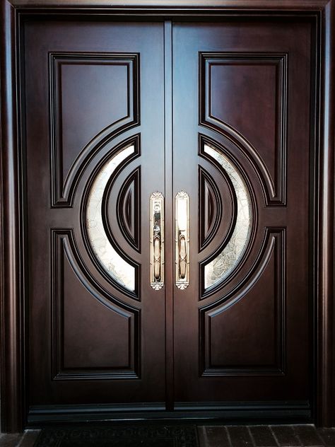 5' x 8' XL-34c. Our 2 1/2" thick "mansion" door is manufactured with mahogany wood over a metal core. No metal is visible, only the mahogany shows. The door will not warp, split, or crack. It comes pre-finished, pre-hung, weatherstripped, hinged, and comes with 3 1/2" interior and exterior casing. The glass is triple glazed with brass caming. Jamb extensions are available. Available in a right hand or left hand interior swing. Entry hardware not included.  Dimensions are 61 1/2" x 97" x 5 1/4" Pintu Ganda, Pintu Interior, Double Front Entry Doors, Entry Door Designs, Double Doors Interior, Wooden Front Door Design, Wooden Main Door, Wooden Main Door Design, Double Door Design