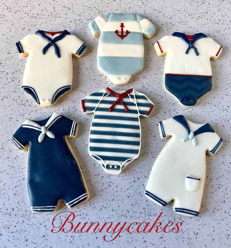 Sailor onesie sugar cookies for a nautical baby boy shower. Follow Bunnycakes on Instagram @bunnycakesandcookies and on Facebook @bunnycakes ⚓️ Nautical Baby Shower Cookies, Sailor Theme Baby Shower For Boy, Baby Shower Cookies For Boy, Nautical Baby Shower Girl, Nautical Food, Nautical Cookies, Baby Shower Cupcakes For Boy, Nautical Baby Shower Boy, Sailor Baby Showers