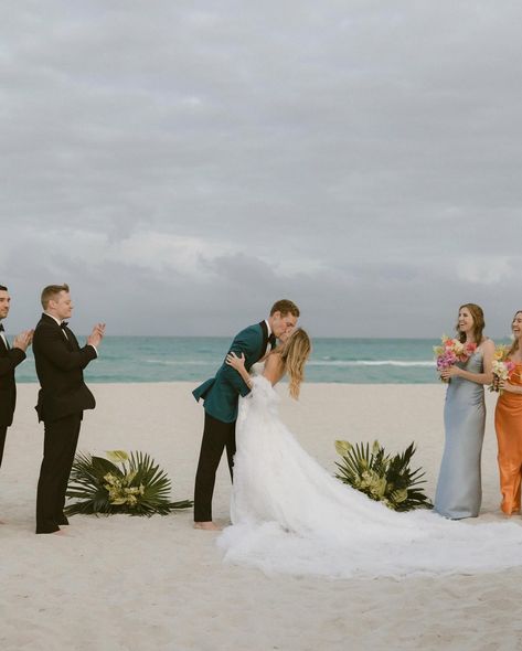 Erin & Will gave their guests the ultimate Miami Beach wedding. They wanted a mix of modern elements with all the Miami tropical vibes. It was the perfect night under the stars. Planning @thehouseofgather Photographer @laurenalatriste Florist @calma_floral Venue @wsouthbeach Entertainment @dreammachineent Dress @inesdisanto Boutique @chicparisien HMUA @bellelite BTS Content @btsbysonja for @laurenalatriste #miamiwedding #destinationwedding #destinationweddingphotographer Calma Floral, Groom Beach Wedding, Beach Wedding Style, Beach Wedding Groom, Miami Beach Wedding, Night Under The Stars, Oceanfront Wedding, Romantic Couple Poses, Wedding Kiss