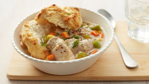 No, you don't have to turn your slow cooker upside down to enjoy this savory pot pie.  Pop biscuits in the oven about 30 minutes before it's done, then serve the chicken mixture over the biscuits.  Bottoms up! Upside Down Chicken, Slow Cooker Chicken Pot Pie, Chicken Potpie, Homemade Chicken Pot Pie, Pot Pies, Comfort Food Recipes Dinners, Slow Cooker Dinner, Comfort Dishes, Slow Cookers