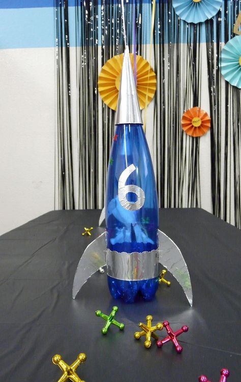 Center piece! Just get wine bottles to transform them into Rocket SHips! Spaceship Birthday Party, Spaceship Birthday, Rocket Decorations, Rocket Ship Party, Space The Final Frontier, Planet Party, Birthday Party Boy, Rocket Party, Lifestyle Journal