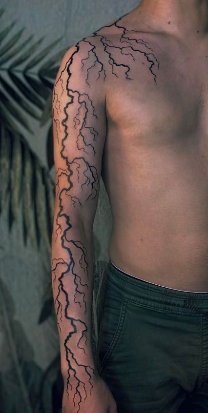 100 Electrifying Lightning Tattoo Designs - Tattoo Me Now Forearm Lightning Tattoo Men, Lighting Strike Tattoo Design, Lighten Bolt Tattoo, Lightening Tattoo On Shoulder, Lightning Tattoo Realistic, Hand Tattoos Lightning, Amazing Tattoos For Guys, Black Lightning Tattoo, Zeus Lightning Tattoo