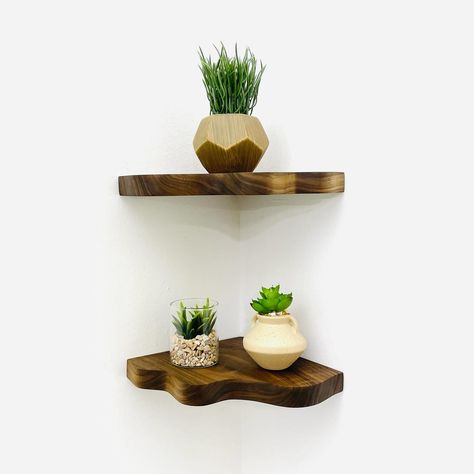 Introducing our new Wavy Corner Shelves, crafted from beautiful walnut wood. With their rustic, wavy design, these shelves are easy to install and look fantastic when you stack two or three together. Perfect for adding a touch of charm to any corner of your home. 🪵 #interior #spring #style #kitchen #aesthetic #neutral #walnut #cornershelves #homedecor #homeinterior Floating Corner Shelves, Walnut Shelves, Unique Shelves, Shelving Solutions, Corner Space, Wavy Design, Corner Shelf, Coaster Furniture, Wall Plug