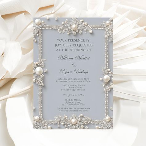 Elevate your wedding celebration with this exquisite invitation template from our exclusive DIAMONDS AND PEARLS collection.  This elegant and editable design allows you to seamlessly personalize every detail. Simply upload your information into Canva, a user-friendly online editor accessible through any web browser or mobile device, and create a truly unique invitation.  This 5 x 7 inch template complements A7 envelopes (5.25 x 7.25 inches) for a perfect fit, ensuring a sophisticated and memorable experience for your guests. 


.#WeddingInvitations #DIYWedding #WeddingStationery #WeddingInspiration #WeddingPlanning Wedding Ideas Pearls, Blue And Pearl Wedding, Simple Wedding Invitations Elegant, Pearl Wedding Theme, Elegant Wedding Invitations Luxury, Unique Wedding Invitations Elegant, Starlight Wedding, Pearl Invitations, Pearl Wedding Invitations