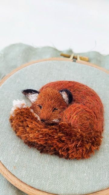 Megan Zaniewski on Instagram: "Zzz 🦊... Embroidering a sleeping fox from start to finish. I'm still thinking about what type of cozy sleeping place I'll create for him next. Maybe a mossy, leaf-strewn forest floor? 🍃🌿🌲 Edit: the finished piece is available in my Etsy shop (link in bio)" Fox Embroidery Simple, Megan Zaniewski, Craft Embroidery, Rainy Day Crafts, Fox Embroidery, Forest Floor, Fox Art, Embroidery Inspiration, Diy Embroidery