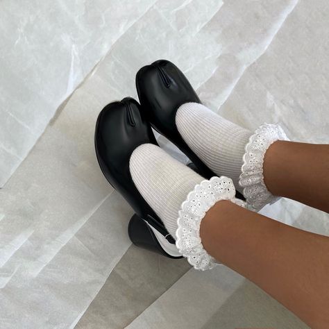 black tabi boots worn with white lace socks margiela tabi boots instagram fashion archive tabi heels tabi sandals Tabi Sling Back, Black Tabi Boots Outfit, Tabi Heels Outfit, Tabi Slingback Outfit, Tabi Shoes Aesthetic, Tabbies Shoes, White Tabi Boots Outfit, Margiela Tabi Boots Outfit, Tabi Outfits Women