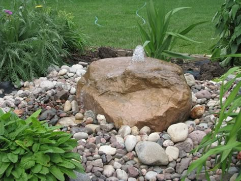 Bubbling Rock, South Eastern Wisconsin including Madison and Milwaukee area- Landscape Contractor, Outdoor design, Patios, Retaining Walls, Outdoor Entertainment, Landscape Designer, Custom Water Features Water Rocks Landscape, Pottery Fountain, Boulder Fountain, Patio Water Feature, Pondless Water Features, Pondless Waterfall, Rock Fountain, Water Gardens Pond, Fountain Ideas