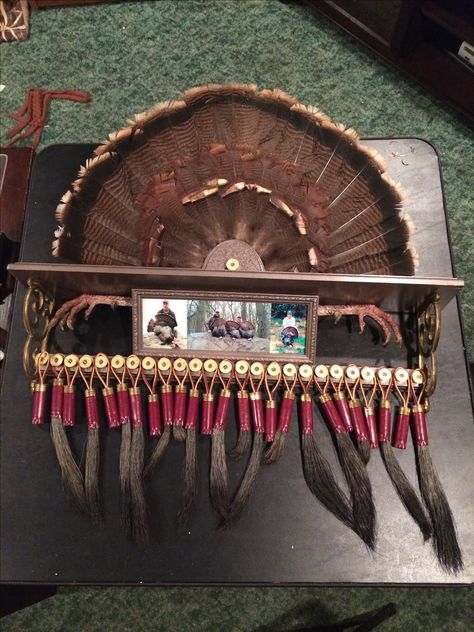 Turkey beard, fan, and spur display from recycled shelf and shotgun shells Turkey Hunting Decor, Turkey Mounts, Deer Hunting Decor, Shotgun Shell Crafts, Hunting Crafts, Turkey Fan, Taxidermy Decor, Taxidermy Display, Hunting Diy