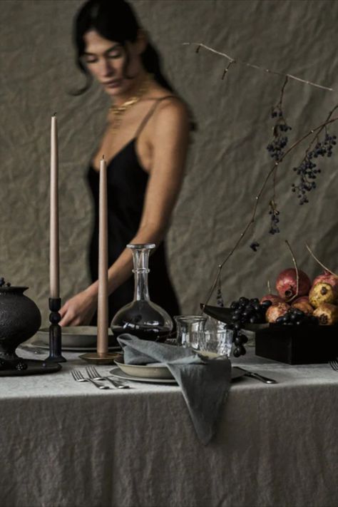 Ready to start planning your elegantly eerie night? Keep reading for some of our favorite chic Halloween décor, including black decorations and tabletop essentials that quite honestly stand up all year round. Dark Fall Tablescape, Moody Thanksgiving Table, Moody Feminine Aesthetic, Moody Thanksgiving Tablescape, Moody Thanksgiving, Moody Tablescape, Dinner Party Tablescapes, Christmas Moodboard, Tablescape Design