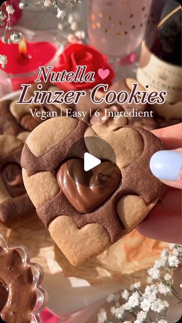 Foodie | Recipe | Delicious on Instagram: "Nutella 🍫 Stuffed Sandwich Cookies! 🍪 

These vegan, egg-free, and dairy-free delights by @thelittleblogofvegan feature a charming two-toned heart design—ideal for Valentine’s Day!

#nutellacookies #nutella #cookies #nutellalovers #chocolate #brownies #kuekering #nutellalover #nutellalove #nutellabrownies #cookiesmurah #nutellacake #nutellapancakes #foodporn #nutellaaddict #kuelebaran #foodphotography #nutellabready #cookiesofinstagram #nastarpremium #nutellacheesecake #hamperslebaran #nutellago #cookiesraya #biskutraya #kuekeringlebaran #nutellapizza #dessert #nutellaandgo #foodie" Heart Effect, Nutella Pizza, Nutella Go, Nutella Pancakes, Nutella Lover, Dubai Food, Nutella Cheesecake, Vegan Blog, Linzer Cookies